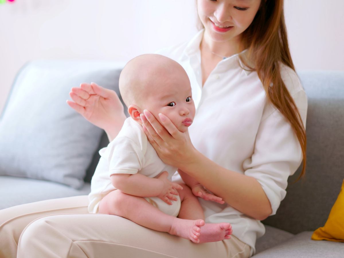 when to stop burping breastfed baby